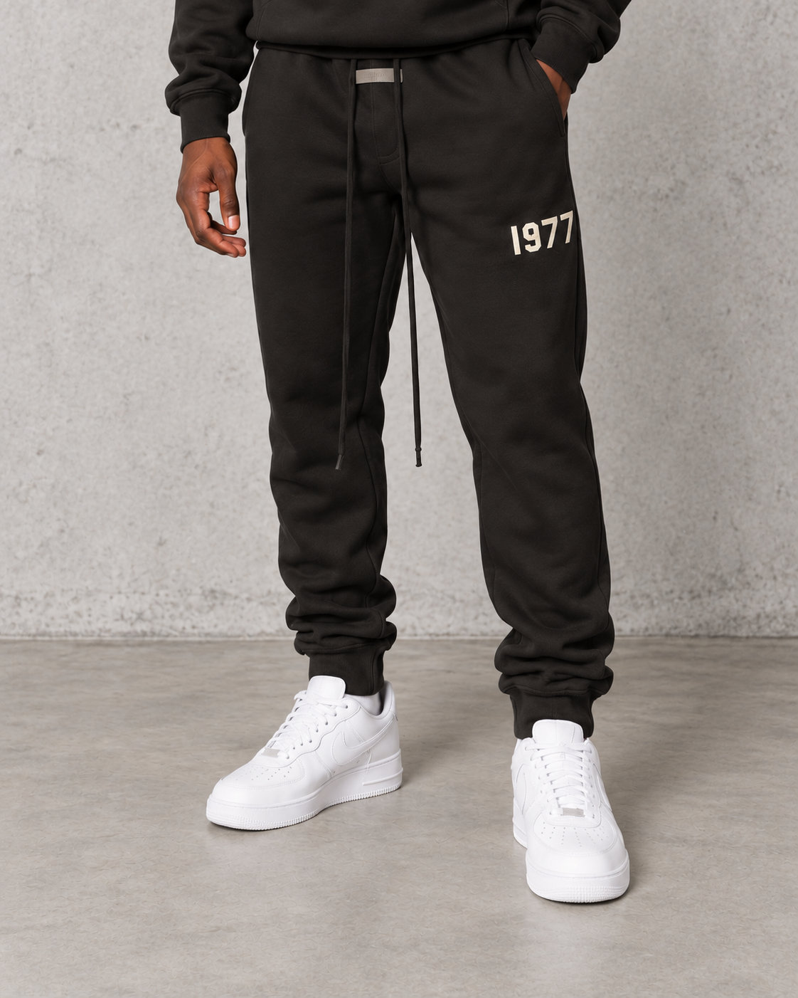 Fear of God Essentials 1977 cuffed joggers in iron, sold separately