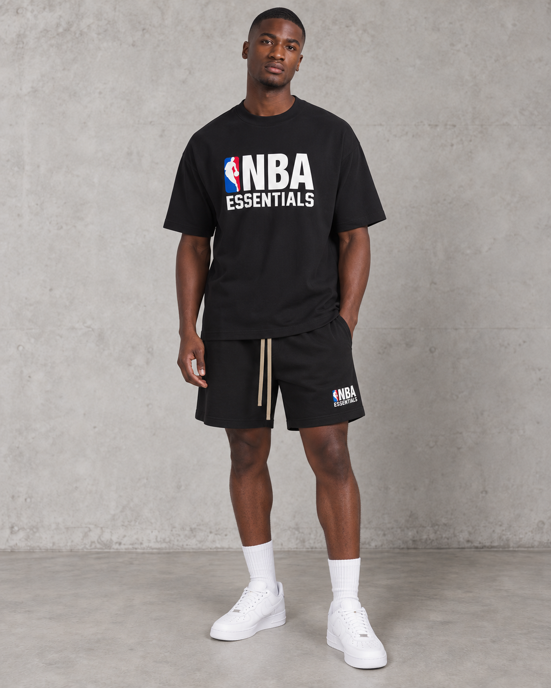 Fear of God Essentials NBA Short Set - Black — model wearing the product