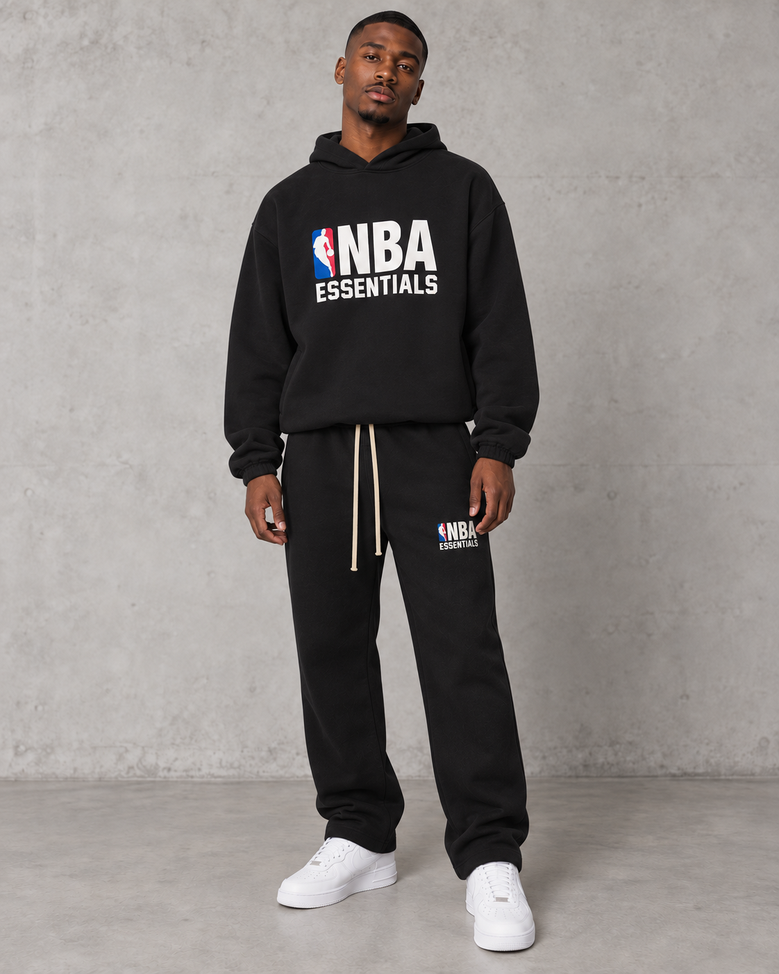 Fear of God Essentials NBA Tracksuit - Black — model wearing the product