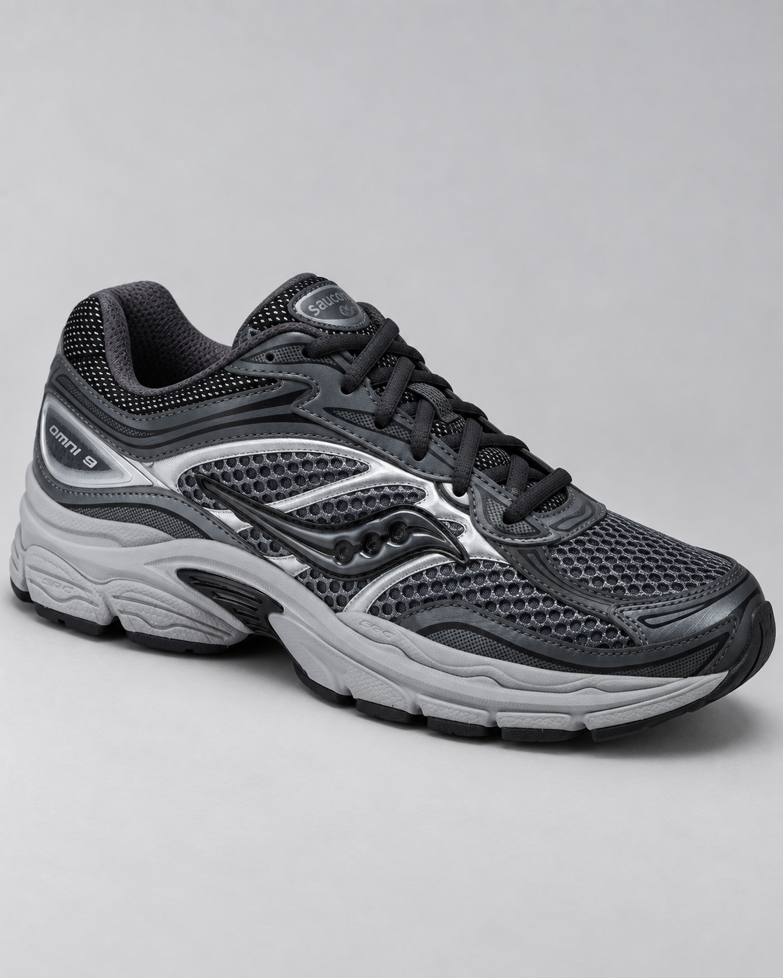 Saucony ProGrid Omni 9 - Black/Grey — studio product photo